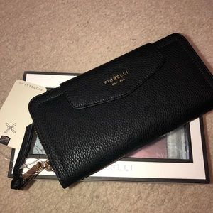 Black wallet by Fiorelli